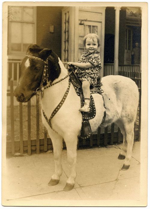 Little-girl-on-pony-old-photograph